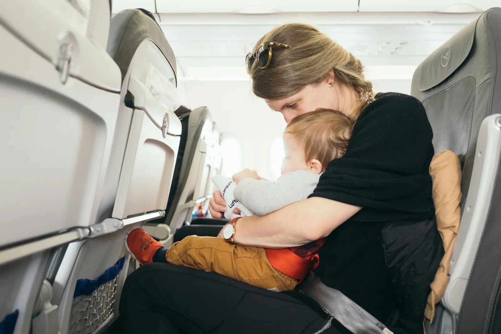 Family on Flight - Family Travel On A Budget
